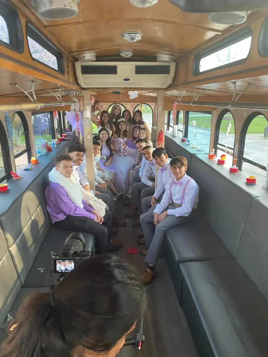 Group riding the trolley limo bus